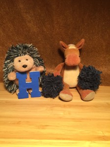 GIVE US AN H! H is Hedge! Hedgehogs root around hedges for food.  